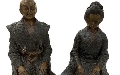 A modern Japanese bronze of a Samurai and his wife,...
