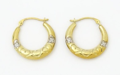 A pair of 9ct gold hoop earrings. Approx. 3/4" long Please Note - we do not make reference to the