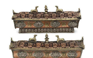 A pair of Tibetan silver and copper incense burners Late 19th century...