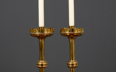 A pair of Victorian turned brass candlesticks