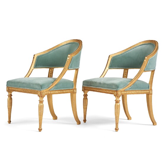 A pair of late Gustavian armchairs attributed to E Öhrmark.