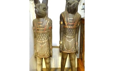 A pair of very large 20thC carved wooden standing Anubis / A...