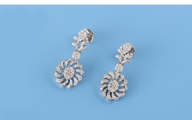 A pair of white gold diamond flowerhead pendant earrings, th...