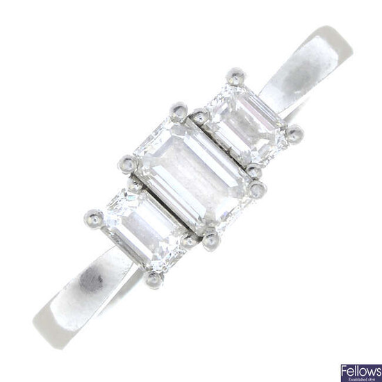 A platinum rectangular-shape diamond three-stone ring.