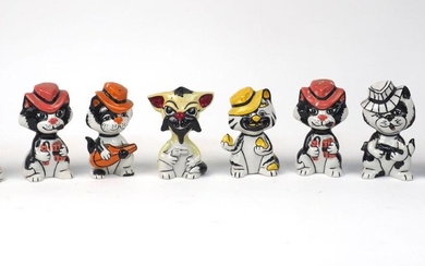 A quantity of Lorna Bailey pottery cats, 20th century and later, to include cats wearing fedoras and holding various weapons, artist marks to bases, 13cm high (8)