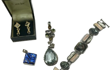 A quantity of silver and costume jewellery, including a hardstone...