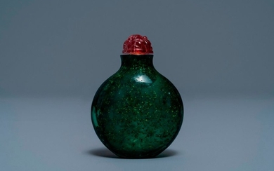 A rare Chinese biotite sandwiched green glass snuff...