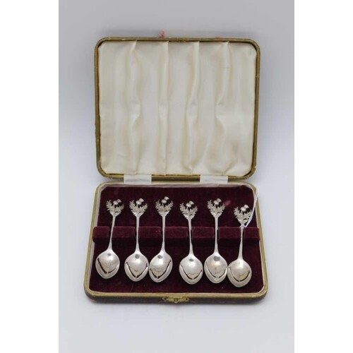 A set of six early 20th century silver coffee spoons, with c...