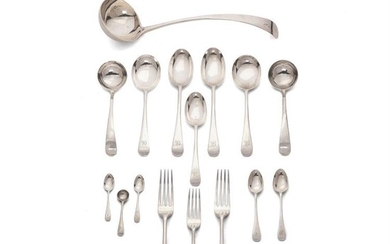 A silver Old English pattern table service for twelve by Josiah Williams & Co. of Bristol