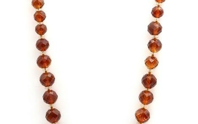 A single row graduated faceted citrine bead necklace