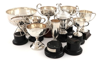 A small collection of silver golf trophies, comprising:...