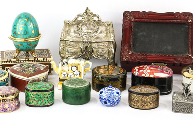 A varied collection of trinket boxes, including a Puurda Manu...