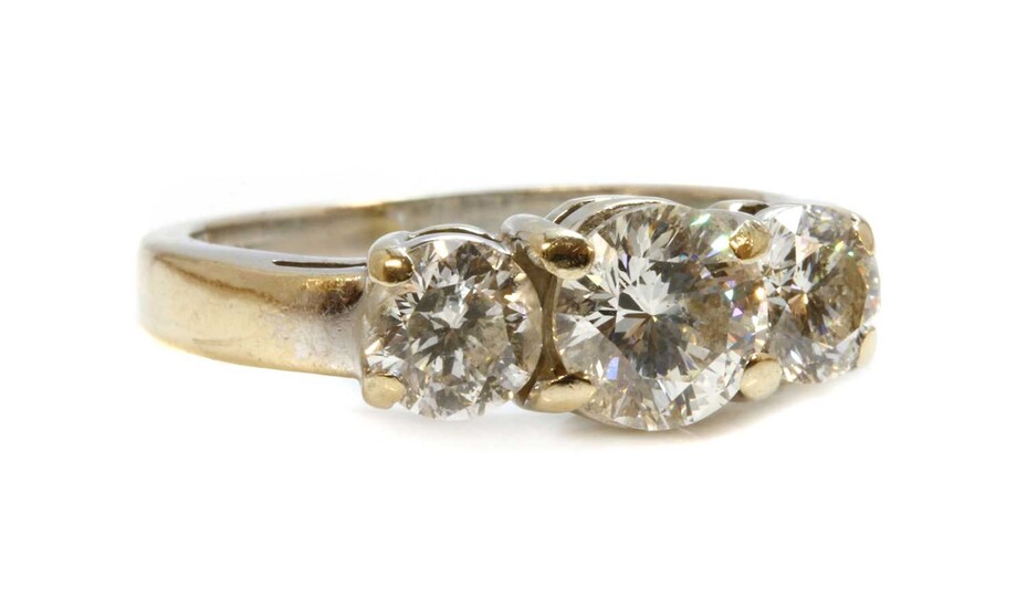 A white gold three stone diamond ring