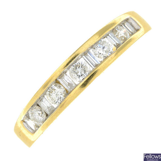 An 18ct gold brilliant and baguette-cut diamond half eternity ring.
