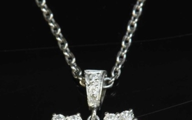 An 18ct white gold diamond set heart pendant and chain