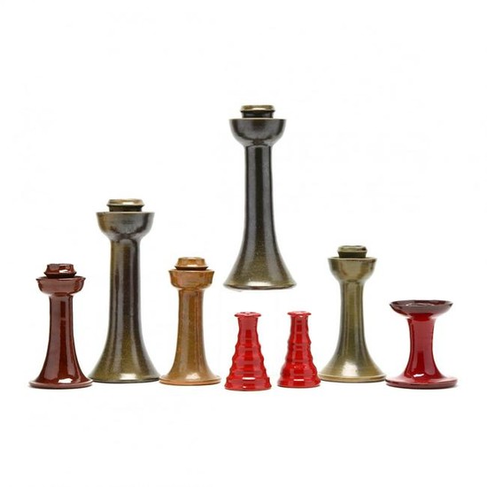 An Assorted Group of Eight NC Pottery Candlesticks