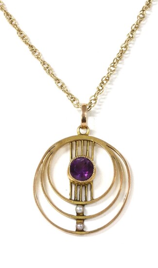 An Edwardian gold amethyst and seed pearl pendant