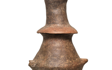 An Etruscan impasto ware urn