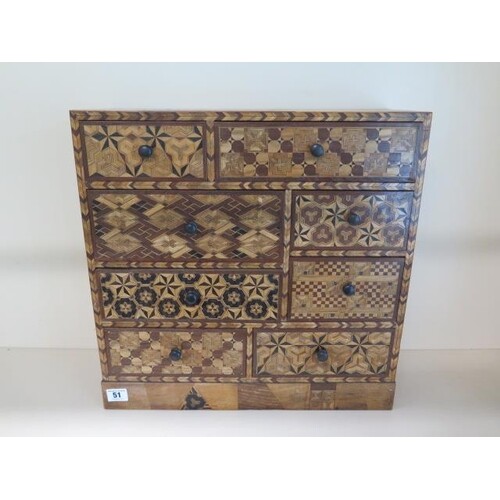 An Oriental parquetry inlaid eight drawer jewellery / collec...