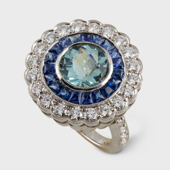 An aquamarine, sapphire, diamond, and platinum ring