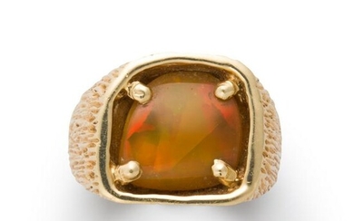An opal and fourteen karat gold ring