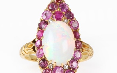 An opal, ruby and pink sapphire marquise form ring