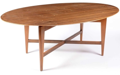 An unusual 1950's oval walnut dining/boardroom table, possibly Morris & Co or Everest.