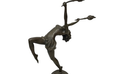 Art Deco style bronze figure of a dancer holding torches alo...