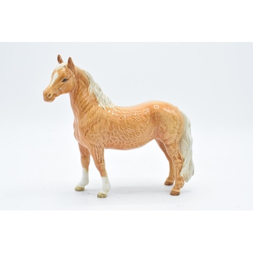 Beswick Pinto pony in Palomino colourway 1373. 17cm tall. In...