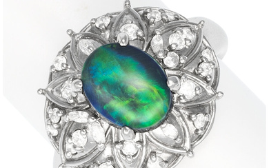 Black Opal, Diamond, Platinum Ring Stones: Opal cabochon; full-cut...