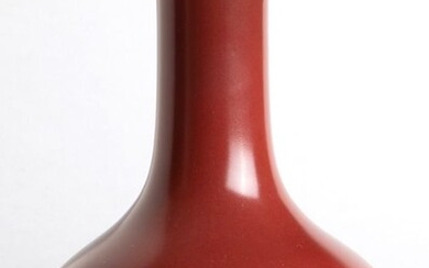 Bottle vase - Porcelain - An Imperial Copper Red Glazed Compressed Bottle Vase, Qianlong Mark And Of The Period- China - Qianlong (1736-1795)