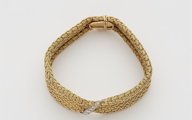 Bracelet tressé avec barrette de diamants Or jaune/or blanc 18 cts. Bracelet souple en fil...