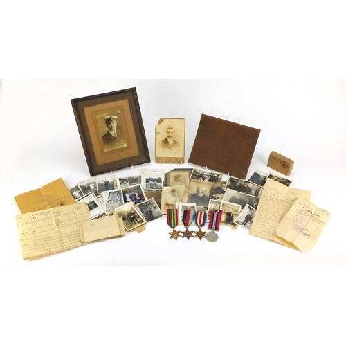 British military World War II four medal group with box of i...