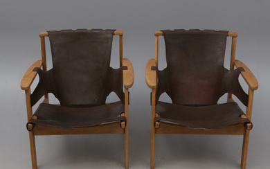 CARL-AXEL ACKING. 2 “Trienna” wood/leather armchairs, labelled Källemo prof. Carl-Axel Acking.