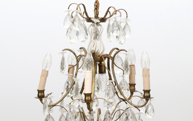 CHANDELIER WITH PRISMS. Brass frame with glass prisms. Rococo style, second half of the 20th century.