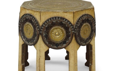 Carlo Bugatti (1856-1940), Octagonal side table, circa 1900, Hammered brass, vellum, ebonised wood, mahogany, pewter, copper, 40.5cm high, 39cm square