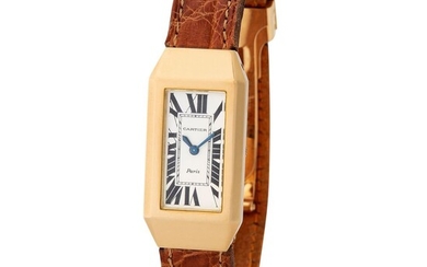 Cartier Paris. Fine and Tasteful Beveled Octagonal-Shaped Wristwatch in Yellow Gold With Silver Roman Numbers Dial and Certificate from Cartier