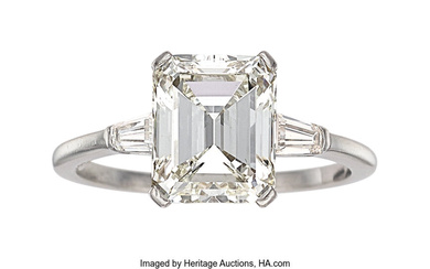 Diamond, Platinum Ring Stones: Emerald-cut diamond weighing 2.77 carats;...