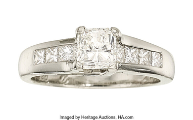Diamond, Platinum Ring The ring features a cut corner...