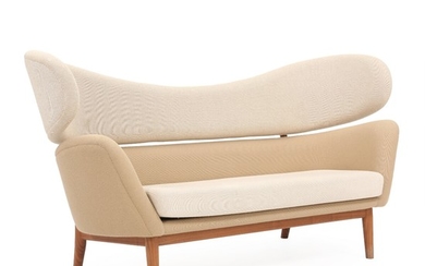 Finn Juhl: Sculptural sofa with frame of walnut wood. Upholstered with light and beige wool. H. 98 cm. L. 195 cm D. 80 cm