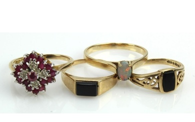 Four 9ct gold/tests 9ct dress rings, stones include diamond,...