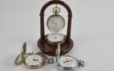 Four pocket watches and stand .