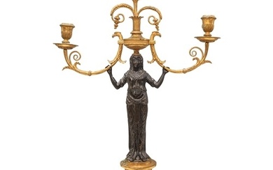 French Empire A pair of patinated brass and ormolu figural c...