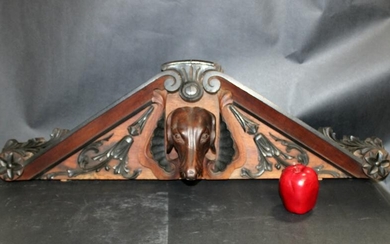 French carved walnut crest with dog head