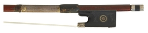 German Silver-mounted Violin Bow - The octagonal stick stamped TOURTE, GERMANY at the butt, the ebony frog with engraved silver fittings, weight 60 grams.