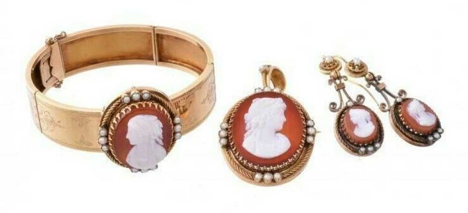 Good quality 19th century hardstone cameo suite, comprising a pendant/brooch, earrings and a hinged bangle, each with an oval agate plaque finely carved depicting the profile of a lady, the frame d...
