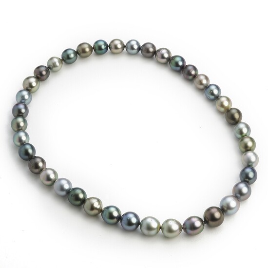 NOT SOLD. Hartmann's: A Tahiti pearl necklace with cultured peacock coloured Tahiti pearls with a...