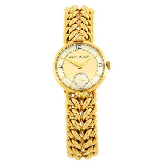 JAEGER-LECOULTRE - a bracelet watch. Yellow metal case, stamped 18ct with poincon. Case width 25mm.