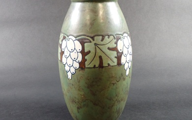 KERAMIS : Vase ovoïde en grès à décor polychrome de pampres de vigne stylisés formant...