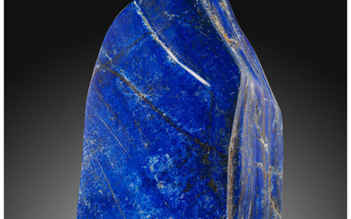 Lapis Free-Form Sculpture Afghanistan This striking offering consists of...